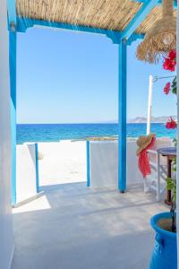 a patio with a view of the ocean at Esperanza Home Mandrakia in Mandrakia