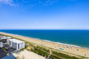 a view of the beach from the balcony of a condo at Carousel 1904 in Ocean City