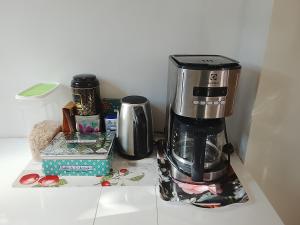 a coffee maker sitting on top of a counter at VILLA Douce Loue in Ornans