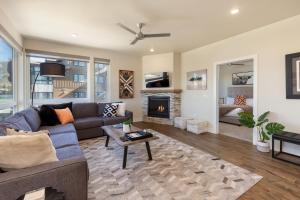 a living room with a couch and a fireplace at Sail Lofts #301 in Dillon