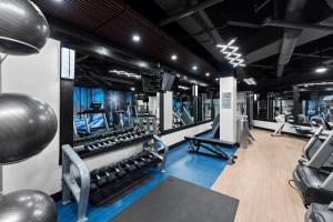 a gym with several treadmills and machines in it at Silver Mill #8274 in Keystone
