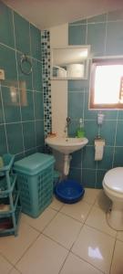 a bathroom with a sink and a toilet at Oasis - Oaza in Sutomore +23 photos