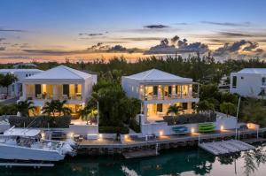 an aerial view of a house with a marina at Second Wind Villa in Long Bay Hills