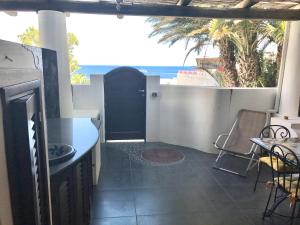 a balcony with a view of the ocean at Casa Lorenzo in Stromboli