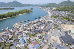 an aerial view of a city next to a river at HOTEL PG3 - Vacation STAY 46442v in Habu