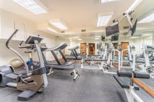 a gym with treadmills and cardio equipment in a building at Highland Greens Lodge #311 in Breckenridge