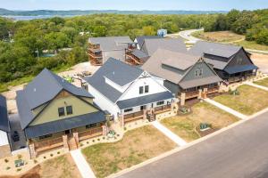 an aerial view of a large house at Branson 10 Bedroom Lakeside Lodge! PRIVATE HEATED POOL! in Hollister