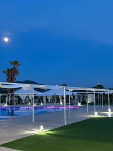 a view of a pavilion at night at Tenuta il Bandito in Montesano Scalo