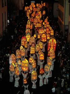a large group of people with lanterns in a crowd at BASEKAMP Prime I Friends I Lake I Mountains I Luzern in Küssnacht