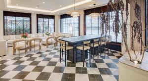 a dining room with a table and chairs at Sercotel Pozuelo in Pozuelo de Alarcón