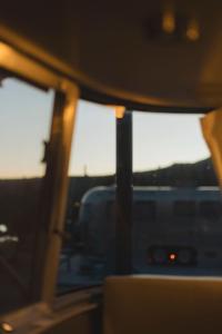 a view from the inside of a car with two windows at Airstream Dream in Orderville +11 photos