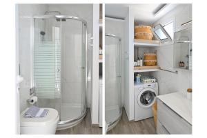 a bathroom with a shower and a washing machine at Aqua Vero Seaside Residence in Hersonissos