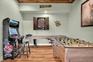 a room with a large table and a chessboard at Meadow View in Banner Elk