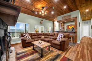 a living room with a couch and a table at Meadow View in Banner Elk
