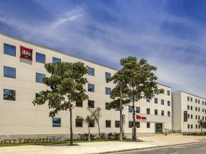 a large white building with trees in front of it at ibis Rio de Janeiro Parque Olimpico in Rio de Janeiro