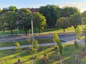 an aerial view of a street with trees and a road at Mini apartment for one person in Tallinn