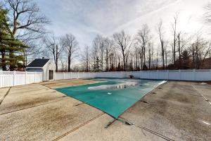 a parking lot with a green umbrella on it at Styles Brook Retreat in Stratton