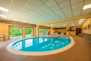 a large swimming pool in a large room at 17A Mountain Village #241 in Dover