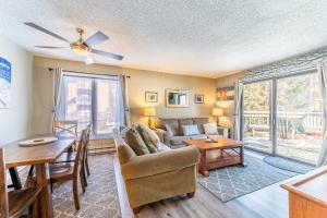a living room with a couch and a table at Key Condo #2929 in Keystone