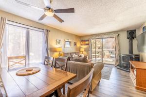 a living room with a couch and a dining room table at Key Condo #2929 in Keystone +44 photos