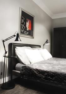 Ліжко або ліжка в номері Regis Residence