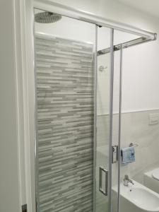 a bathroom with a shower and a sink at Mare e Trabocchi in Fossacesia +14 photos