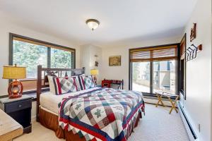 a bedroom with a bed and a window at The Seasons G27 in Dover +72 photos
