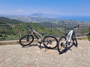 a bike is parked on the side of a mountain at Gredò Home & SPA in Gratteri