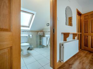 a bathroom with a toilet and a sink at 4 Bed in Schull oc-ii09887 in Schull +25 photos