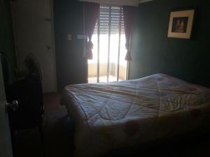 Cama o camas de una habitación en Piria Apartamento Bahiamar