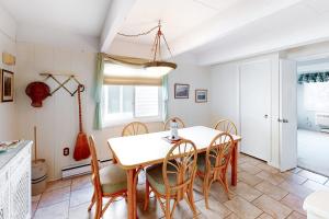 a dining room with a table and chairs at White Sands Village 30 in Ocean City