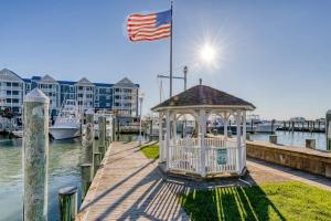 a gazebo on a dock with a flag at White Marlin 209B in Ocean City