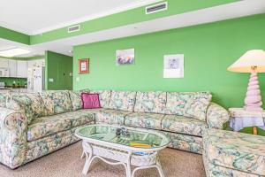 a living room with a couch and a coffee table at Lorelei I 404 in Ocean City