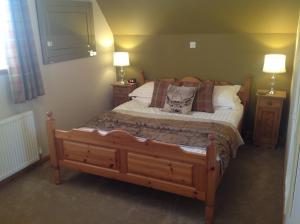 Postel nebo postele na pokoji v ubytování Lochview Guesthouse