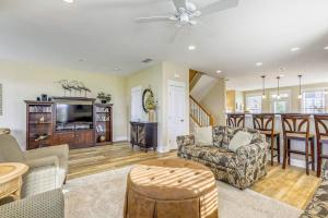 a living room with a couch and a table at 13009 Bowline Ln 1 in Ocean City