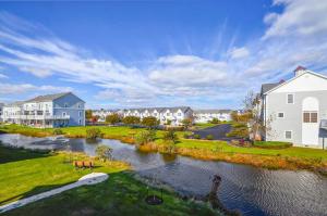 an aerial view of a river in a residential neighborhood at 13009 Bowline Ln 1 in Ocean City