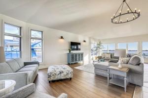 a living room with a couch and a table at Sunset Getaway in Ocean City