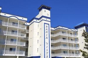 a white building with a clock tower in front of it at Bahia Vista II 305 in Ocean City