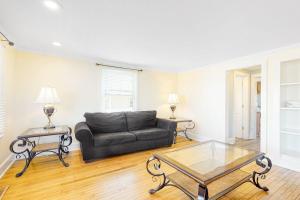 a living room with a couch and a table at 900 Philadelphia in Ocean City