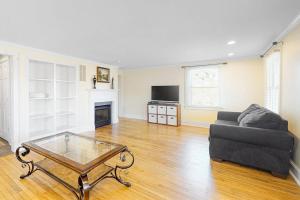 a living room with a couch and a coffee table at 900 Philadelphia in Ocean City