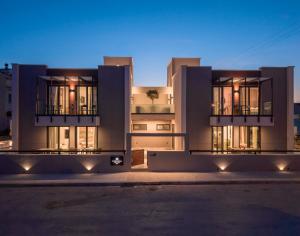 a large building with lights in front of it at PREVEZA VILLA center in Preveza