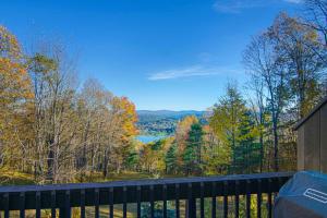 a view of a lake from the deck of a house at Kingswood Vista 10F in White River Junction