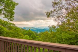 a balcony with a view of the mountains at Pinnacle View Lodge in Boone