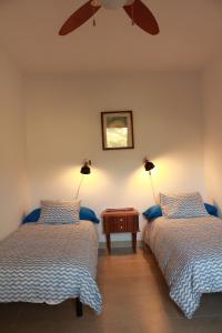 Posteľ alebo postele v izbe v ubytovaní Casa Encontrada + 11 fotografií