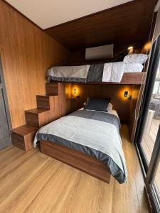 a bedroom with two bunk beds on a boat at MODULAR NUEVA l in San Luis +13 photos