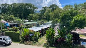 a white van parked in front of a tennis court at Apartamentos Equipados DMR #3 in Uvita