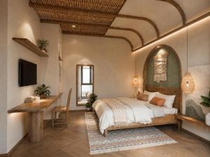 a bedroom with a large bed and a desk in it at Soho Boutique in Quảng Ngãi +75 photos