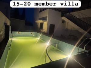 a view of a tennis court with the words member villa at JSP OLIVE NEST villa in Yelagiri
