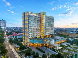 an overhead view of a tall building in a city at The Margo Hotel in Depok