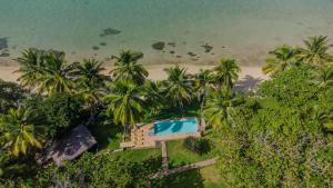 an aerial view of a resort with a swimming pool and a beach at Maeva Beach in Sainte Marie +26 photos